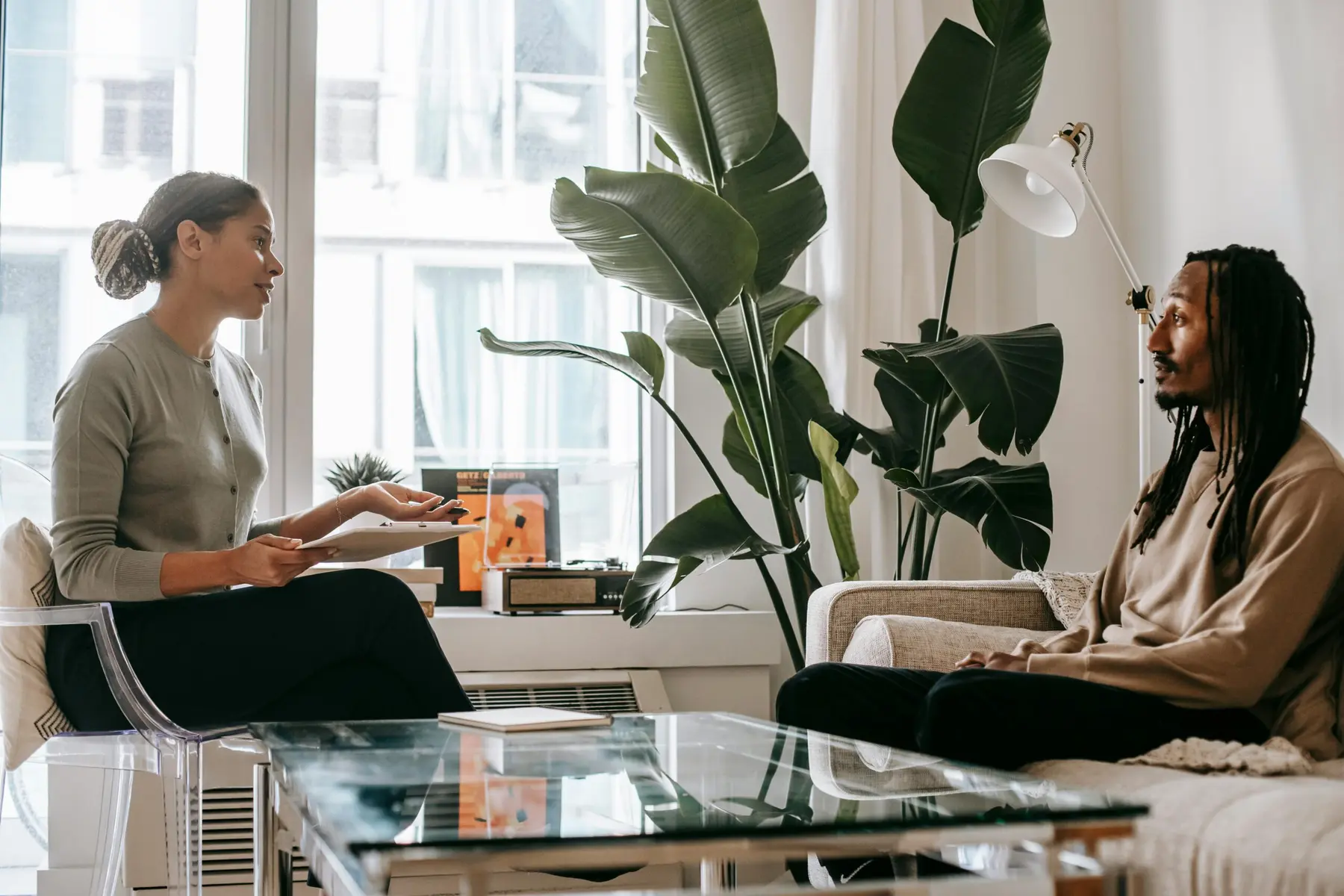 A counseling session in a bright, comfortable room